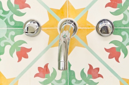 Water tap with colorful backgroud