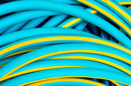 Texture of green and yellow hose show line and patternの写真素材