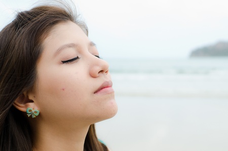 Attractive Asian woman enjoy on the beach, headshotの写真素材