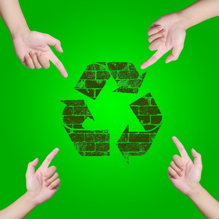 Hand pointing Recycle sign  Save the world concept の写真素材