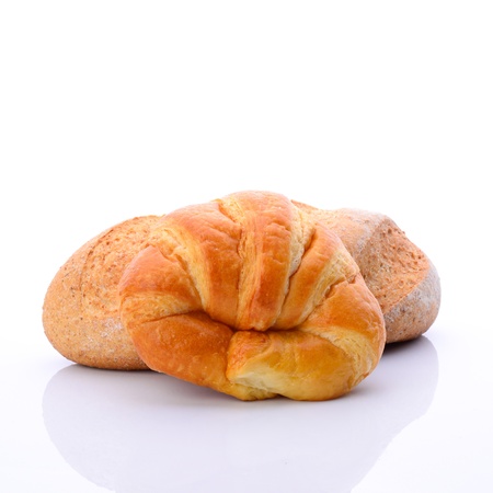 Fresh and tasty croissant over white background