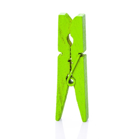 wooden clothes pin on a white backgroundの写真素材