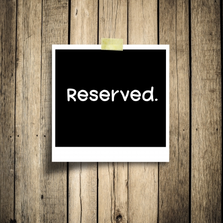 Reserved message  grunge wooden background with copy spaceの写真素材