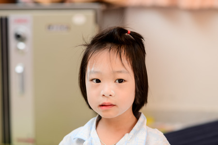 Asian girl in pajamas.の写真素材
