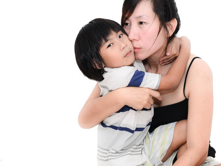 hugging sad mother and daughterのeditorial素材