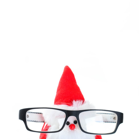 Cute santa doll with eye glasses.の写真素材