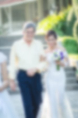 Wedding style abstract blur background bride and groom with bokehの写真素材