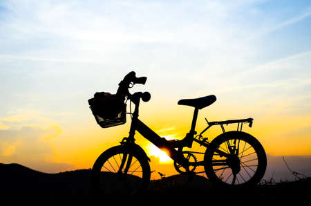 Bicycle silhouette with sun set.の写真素材