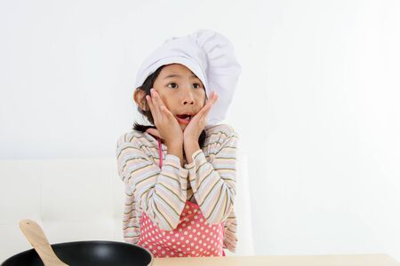 Asian girl cooking at home, food concept.の写真素材