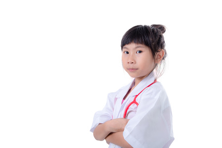 Little girl pretending to be a doctor on white backgroundの写真素材