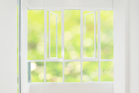 abstract background exterior view looking toward to empty office lobby and entrance doors and glass...