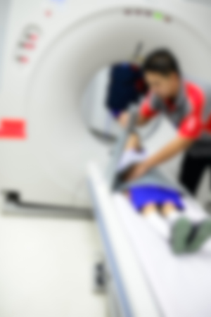 Blurry background examining patient before CT scanの写真素材
