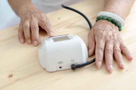 Checking blood pressureの写真素材