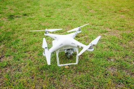 HUA HIN, THAILAND - July 26, 2015: Camera drone on a grassy field before take offのeditorial素材