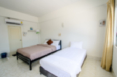 Blurry background of of modern bedroom interiorの写真素材