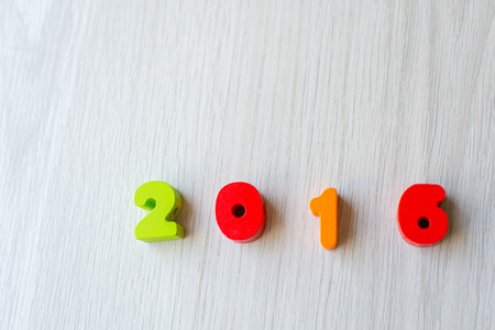 2016 year wood texture on gray background,Holiday concept,Leave space for adding text
