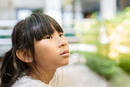 Closed up Asian girl in the park outdoor, DOFの写真素材