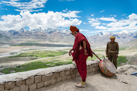 ZANSKAR, INDIA - JULY 15, 2015 : Untitled lama waiting for mystical mask dancing at Karsha Monastery (one of the oldest monastery), Zanskar, North Indiaのeditorial素材