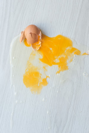 Broken egg on floor.の写真素材