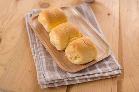 Dried shredded pork bread on wooden tray background