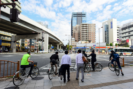 SAKUSA - TOKYO - JAPAN - 07 OCT 2016 : Japanese Peoples waiting at traffic light on Zebra Crossing in Tokyo, Japanのeditorial素材