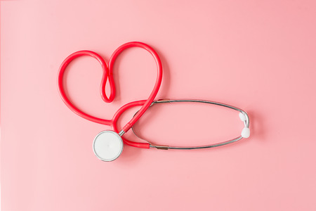 Red Stethoscope in Shape of Heart Isolated Onの写真素材
