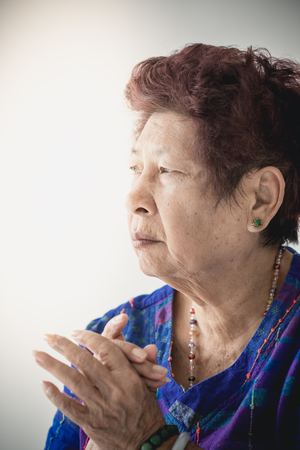 Portrait of smiling senior woman with copyspaceの写真素材