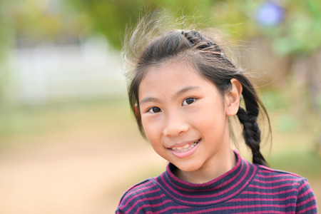 Closeup smiling little girl, Outdoor potraitの写真素材