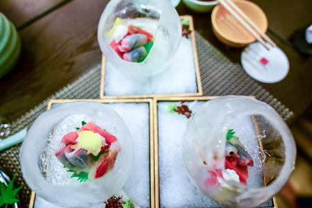 Raw seafood on ice, Japanese food setの写真素材