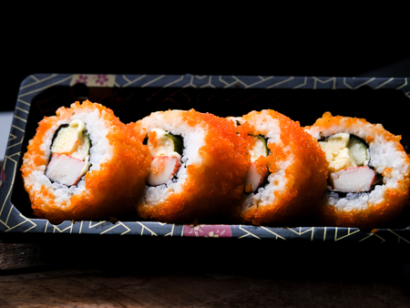 Sushi maki california roll are mood tone color orange. repeat pattern japanese foodの写真素材