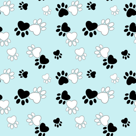 Cute black and white animal footprints on blue background.のイラスト素材