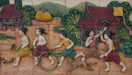 Play of thai children on tile, Wat Pho, Bangkok, Thailandの写真素材