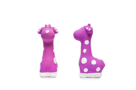 Ceramic giraffe on white backgroundの写真素材