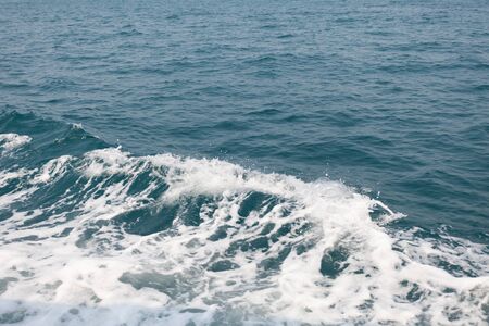 Ocean wave in the Gulf of Thailand photographed closeup