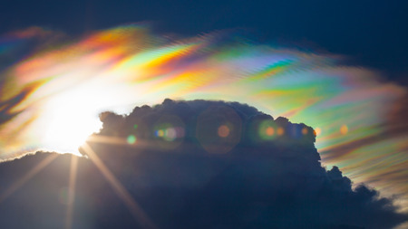 Beautiful iridescent cloud Irisation or rainbow cloudの写真素材