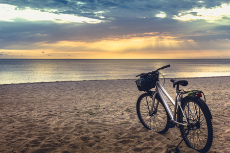 The bicycle and the view in the morning. Samila beach Songkhla.の写真素材