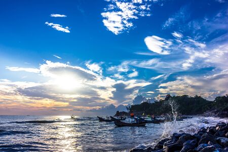 Changes in the sky, the clouds, the sun, the natural beauty of the ocean wavesの写真素材