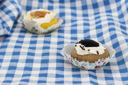 Mini chocolate cake on a blue and white clothの写真素材