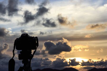 Camera on a tripod Taking natural beautyの写真素材
