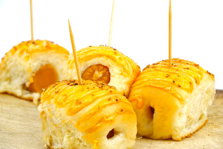 Mini sausage and cheese rolls, sold at roadside shops in Thailand, cheap priceの写真素材