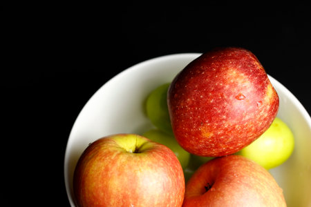 Set of pictures of apples on a black backgroundの写真素材
