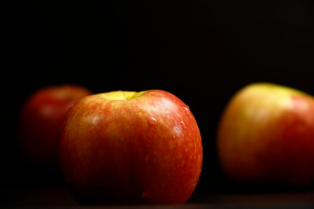 Set of pictures of apples on a black backgroundの写真素材