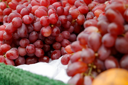 Set of pictures of red grapes sold at roadside fruit shops.の写真素材