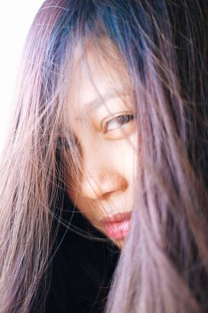 Beautiful Portrait of young Asian girl smilingの写真素材