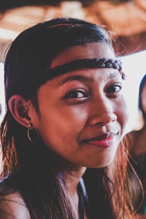 Beautiful Portrait of young tribe Asian girl smilingの写真素材