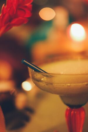 Alcohollic cocktail, Ice blended marguarita in a glass with saltの写真素材