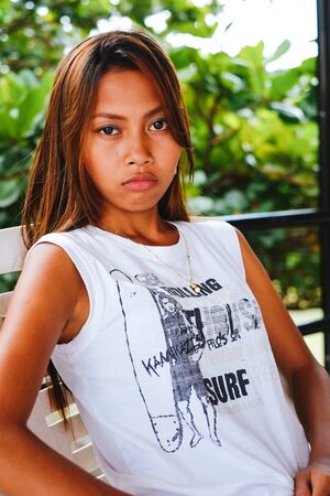 Portrait of a girl with the serious face expression