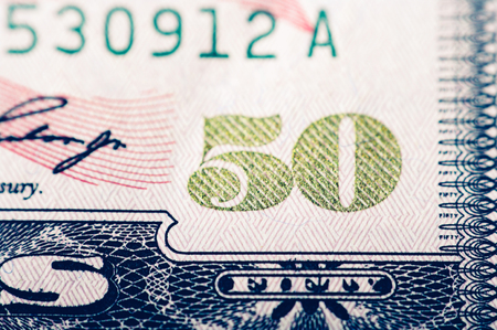 Macro photograph of a fifty dollar bill