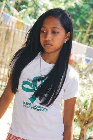 Asian student girl in scout uniform