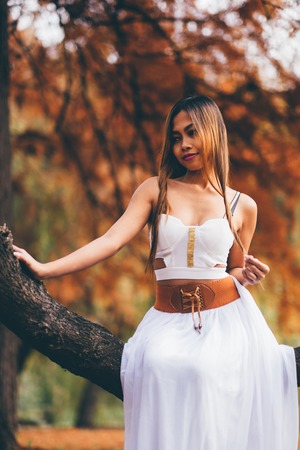 Portrait of beautiful wiccan girl in the forestの写真素材